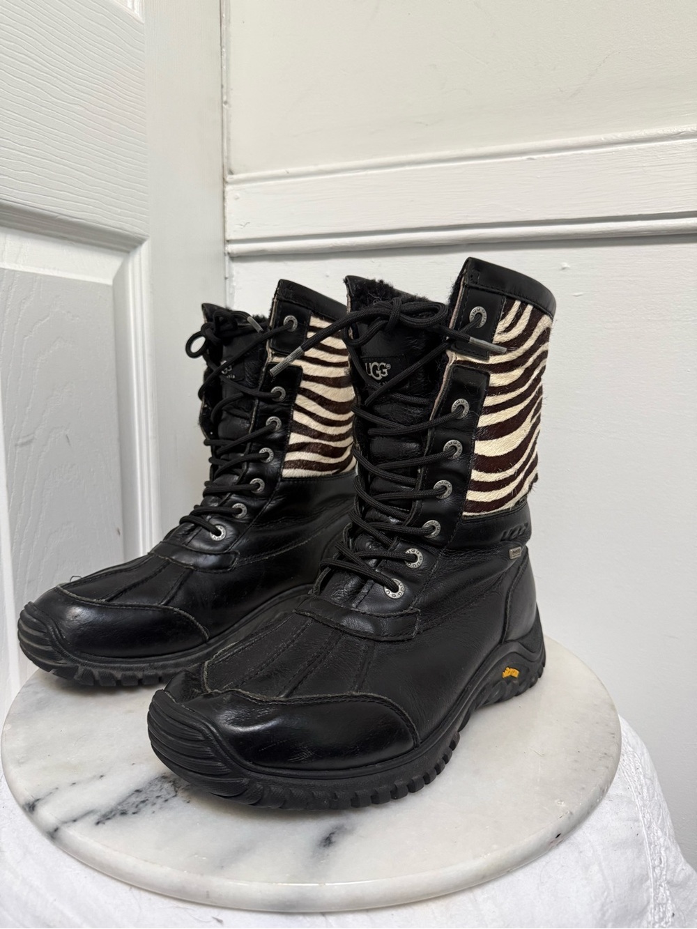 UGG Women's Adirondack II Black Lace-Up Leather Boots with Zebra Print Shaft